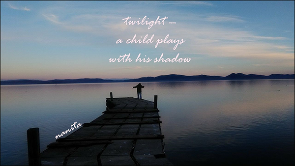 'twilight— / a child plays / with his shadow' by Valentina Meloni