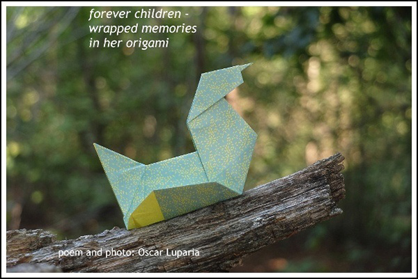 'forever children— / wrapped memories / in her origami' by Oscar Luparia
