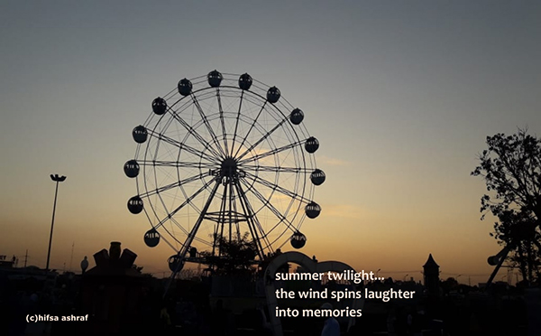 'summer twilight... / the wind spins laughter / into memories' by Hifsa Ashraf