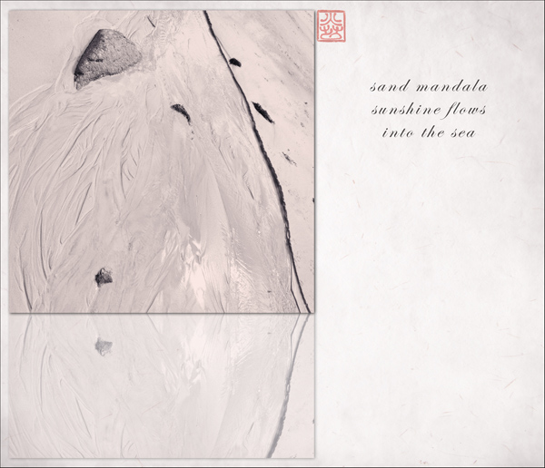 'sand mandala / sunshine flows / into the sea' by Ron Moss