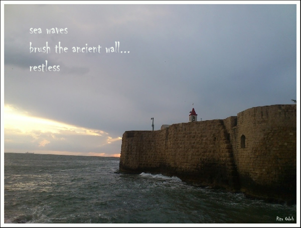 'sea waves / brush the ancient wall... / restless' by Rita Odeh