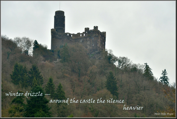 'winter drizzle— / aroun the castle the silence / heavier' by Minh Pham
