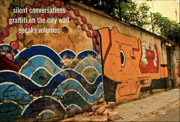 'silent conversations / graffiti on the city wall / speak volumes' by Mona Bedi