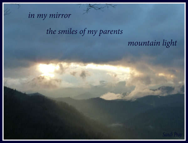 'in my mirror / the smiles of my parents / mountain light' by Sandi Pray